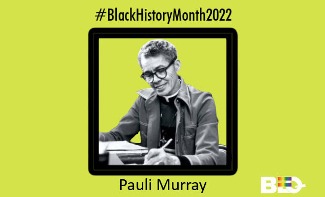 Pauli Murray at a desk writing and smiling as she glances down at her work.